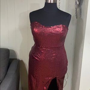 Burgundy strapless dress.